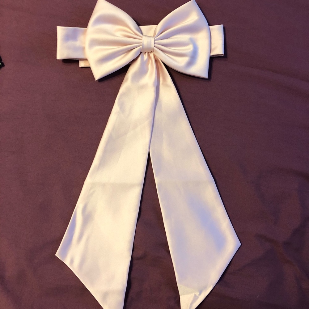Petal pink satin bow, adjustable for girls dress.